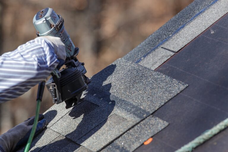 The nail gun is used to attach shingles to the roof.