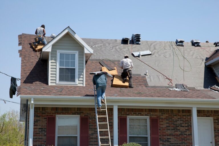 Roofers working